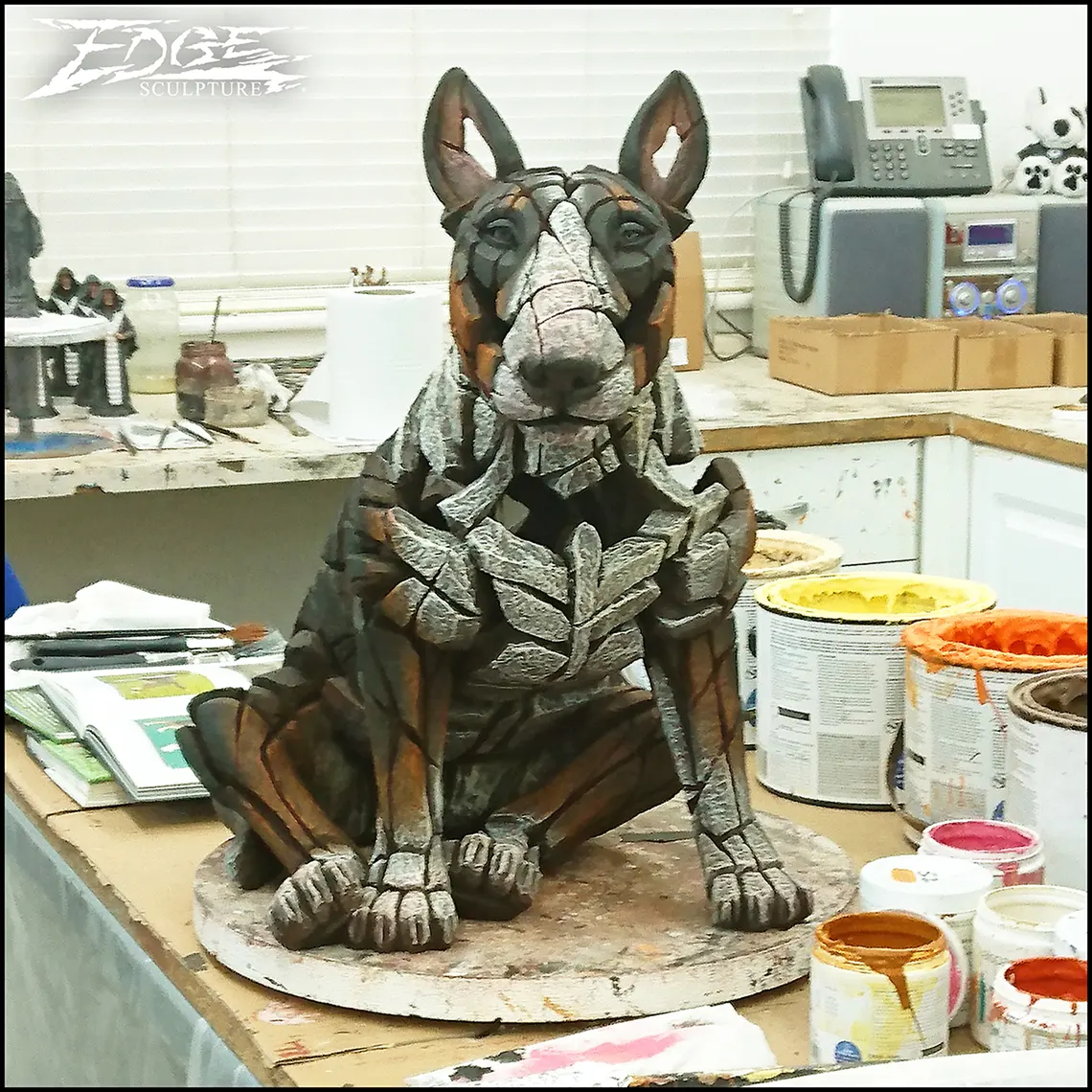 Bull Terrier figure in the painting studio